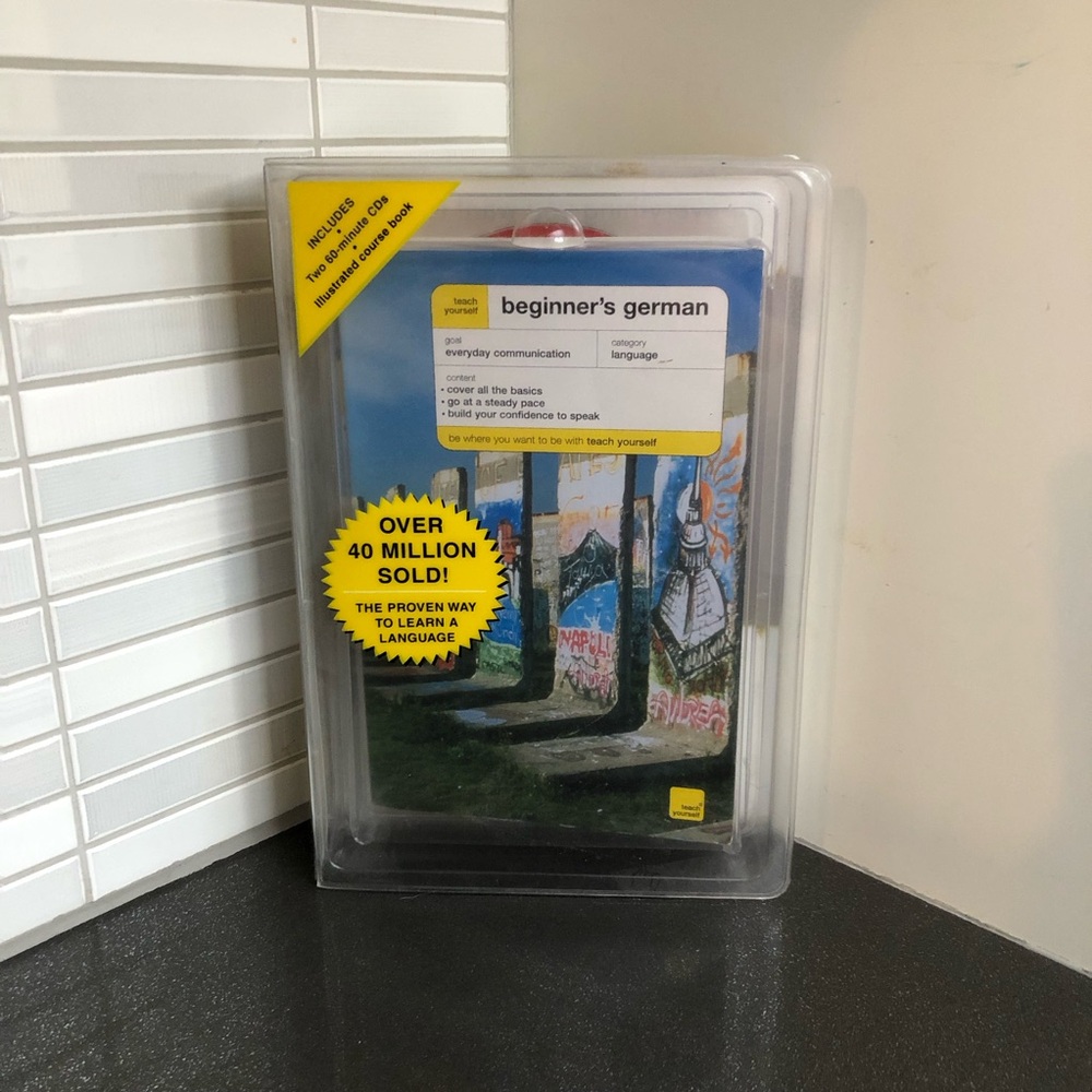 Teach Yourself Beginners German book and 2 DVDs